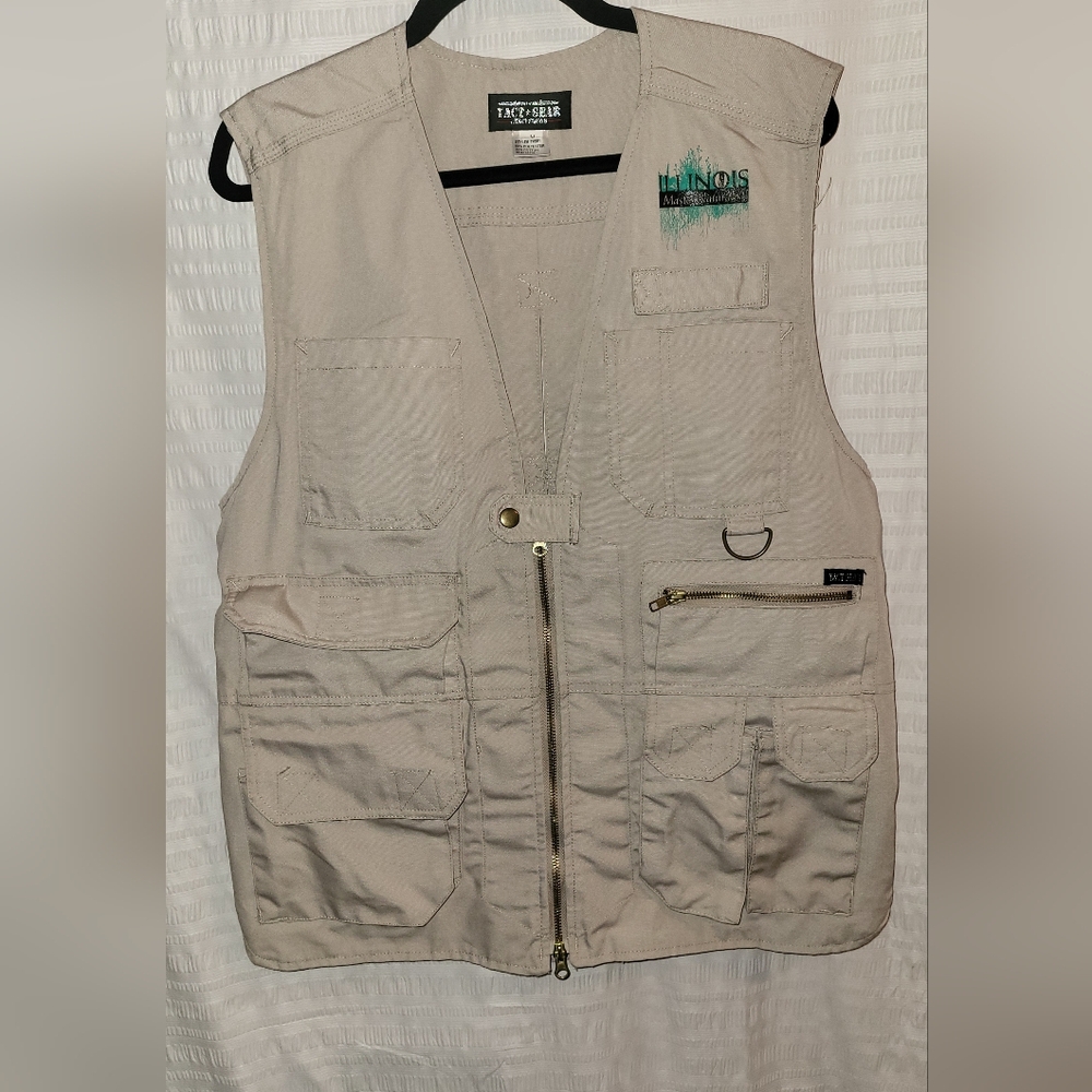 Tact Gear fishing vest/hunting vest.  Size Medium.  Pockets galore. Zip front